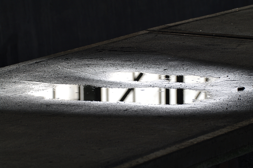 Spiegelung in Pfütze