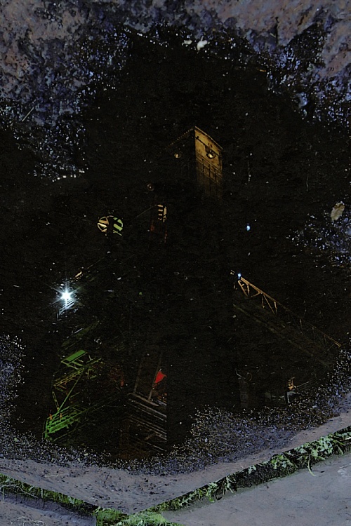 Spiegelung in Pfütze